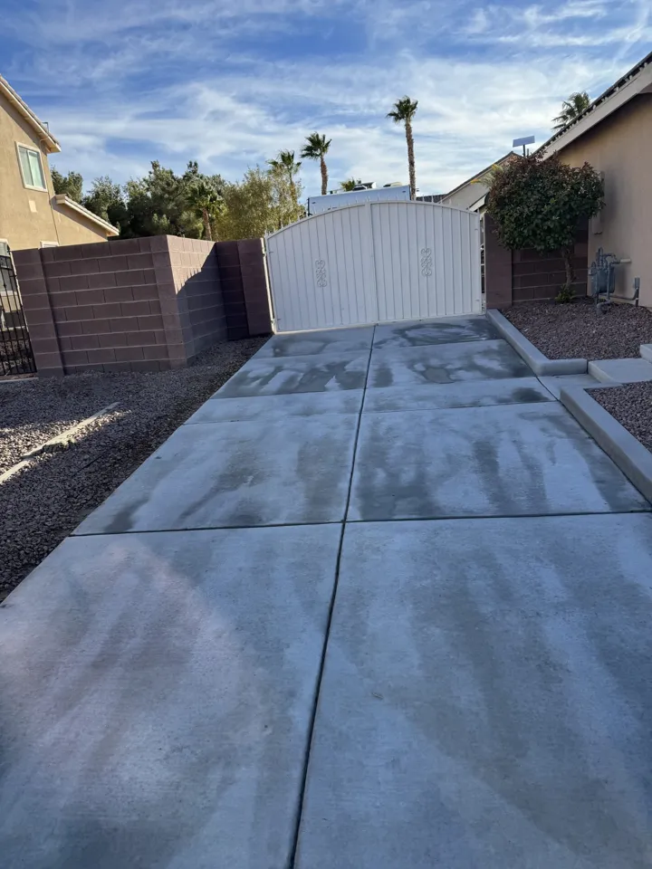 Residential concrete driveway after power washing