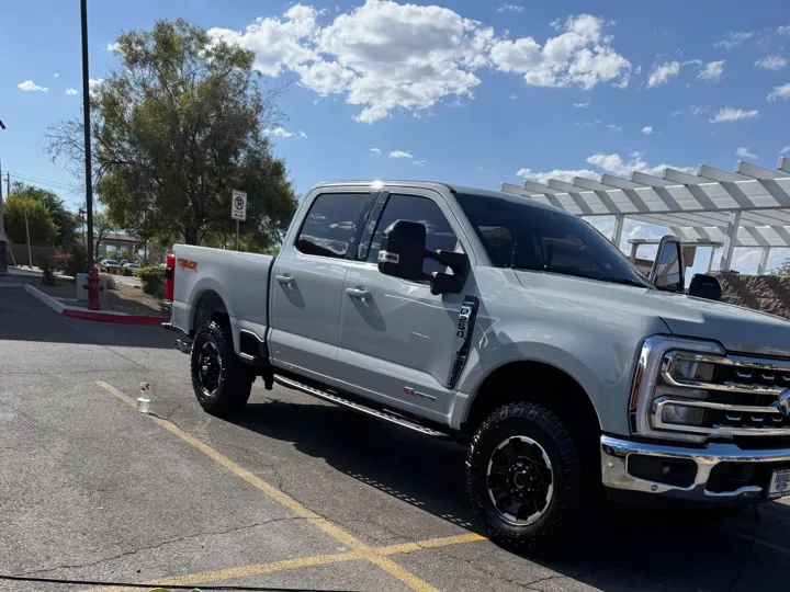 Silver Ford Super Duty pickup truck after an exterior detail